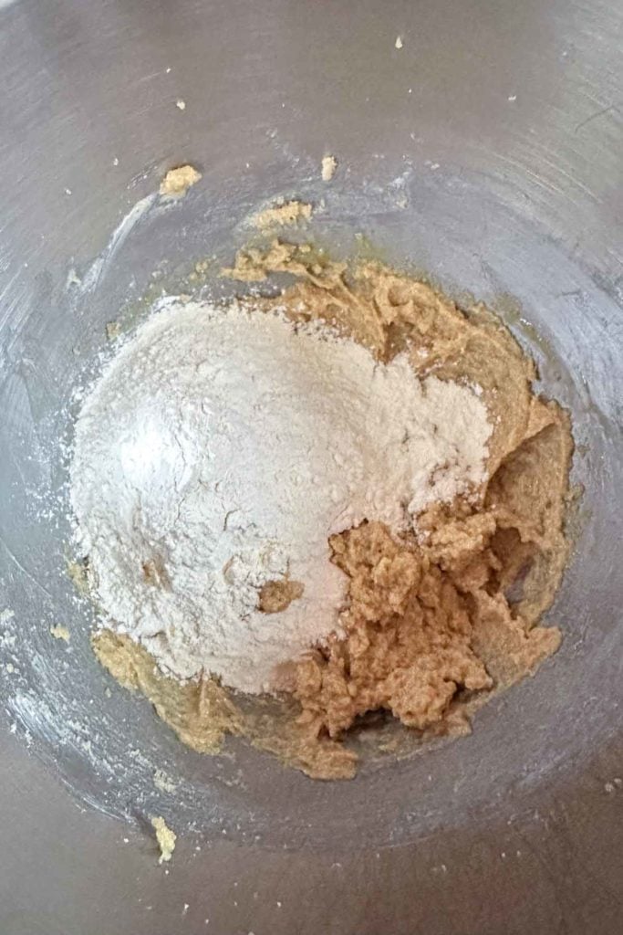 A bowl with flour and other ingredients in it.