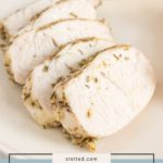 Sliced turkey tenderloin seasoned with herbs, served on a white plate next to a piece of bread. Text overlay reads "easy turkey tenderloin.