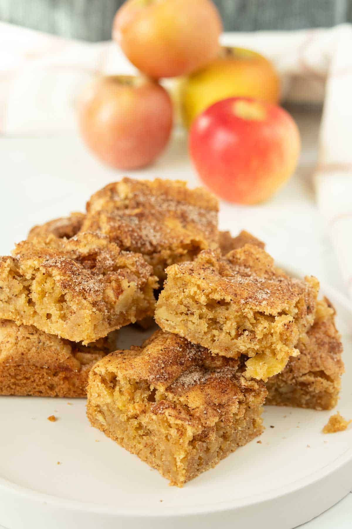 Cinnamon apple squares on a white plate.