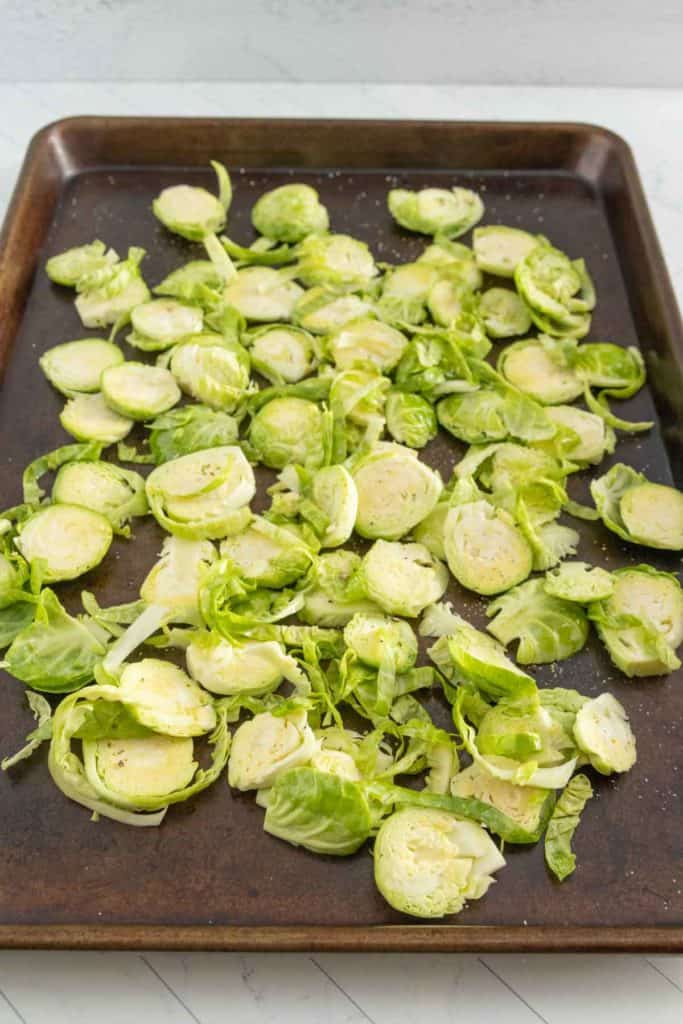 Brussels sprouts on a baking sheet.
