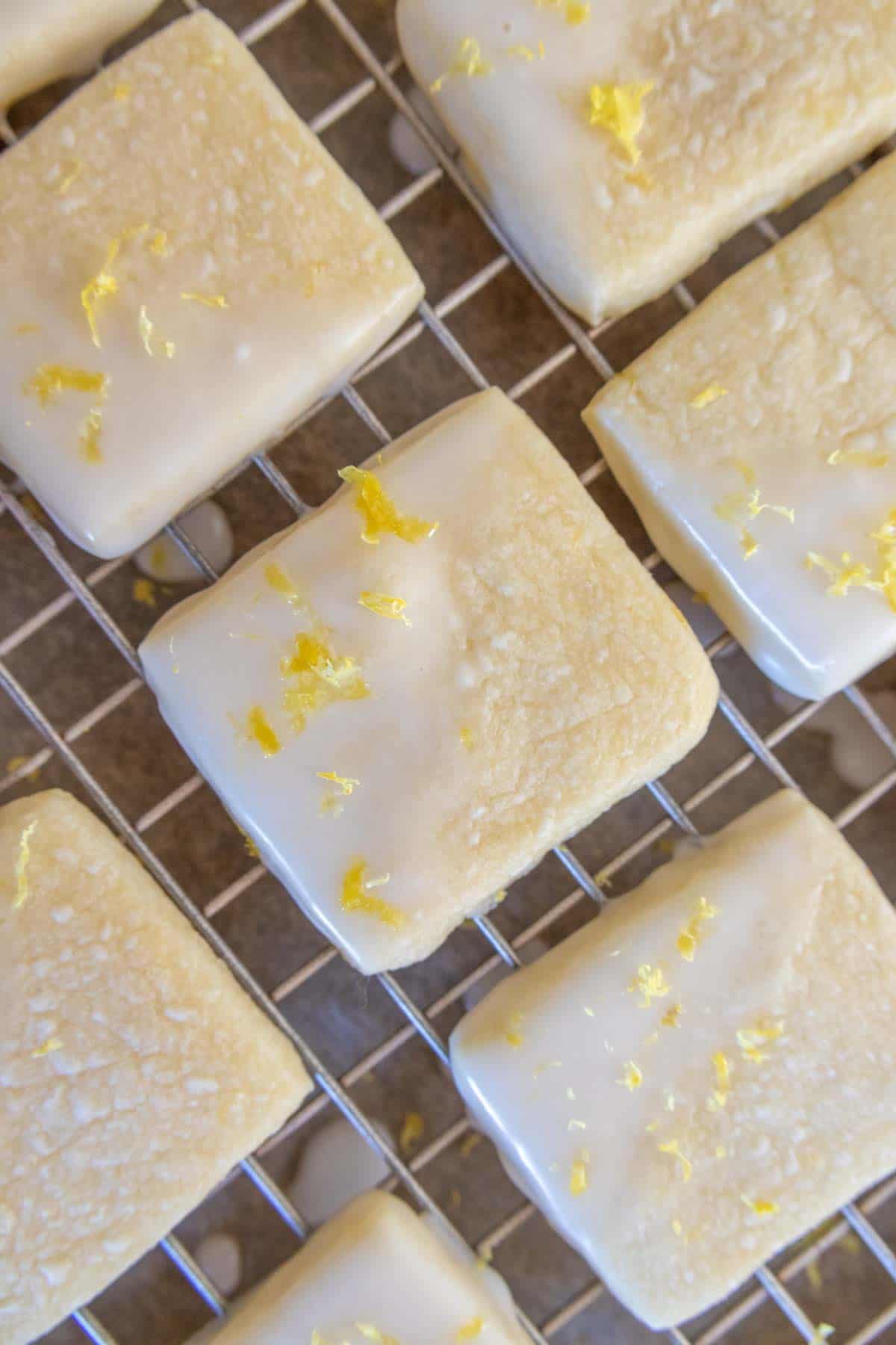 Lemon cookies on a cooling rack.