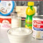 A bowl of sour cream sits in front of butter, evaporated milk, lemon juice, cottage cheese, and milk, with the text "best sour cream substitute" at the top.