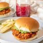 A plate with lentil sloppy joe and jicama salad.