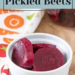 Bowl of homemade pickled beets with instructions on making them.