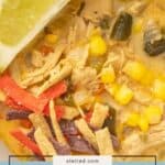 Bowl of hearty chicken poblano soup with corn, tortilla strips, and a lime wedge, viewed from above. Text at bottom reads, "chicken poblano soup.