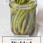 A jar of pickled green beans with a label that reads "quick, easy to make chicken and pickled green beans.