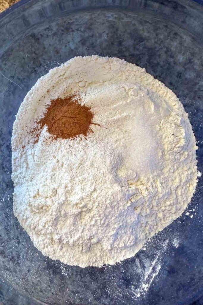 A bowl of flour with cinnamon.