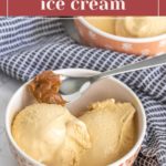 A bowl of creamy dulce de leche ice cream with a generous spoonful of dulce de leche on top sits on a patterned napkin beside another bowl.