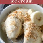 A bowl of banana pudding ice cream topped with crushed cookies and banana slices, with a spoon scooping some ice cream.