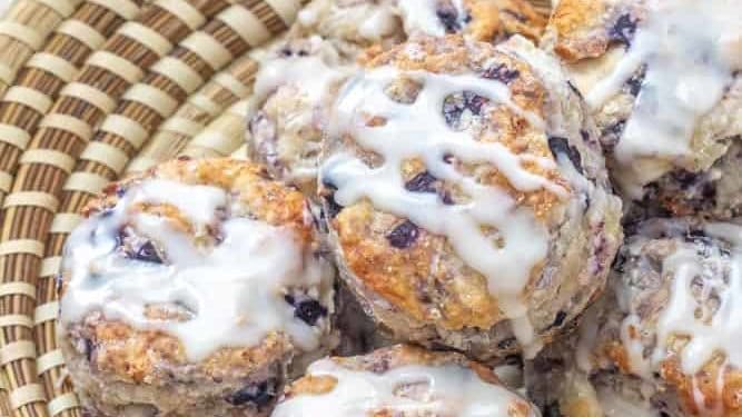 blueberry biscuits with icing in a sweetgrass basket