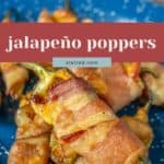 Bacon-wrapped jalapeño poppers on a blue plate, topped with melted cheese, with text overlay reading "jalapeño poppers" and "stetted.com".