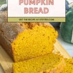 A loaf of pumpkin bread with two slices cut, displayed on a wooden board. The text overlay reads "Pumpkin Bread. Get the recipe at stetted.com.