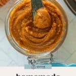 A jar of homemade pumpkin butter with a knife inside, viewed from above. Text below reads "homemade pumpkin butter.