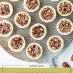 Round platter with small pecan tassies, each in a pastry crust, arranged neatly. Text on image reads “easy pecan tassies.”.