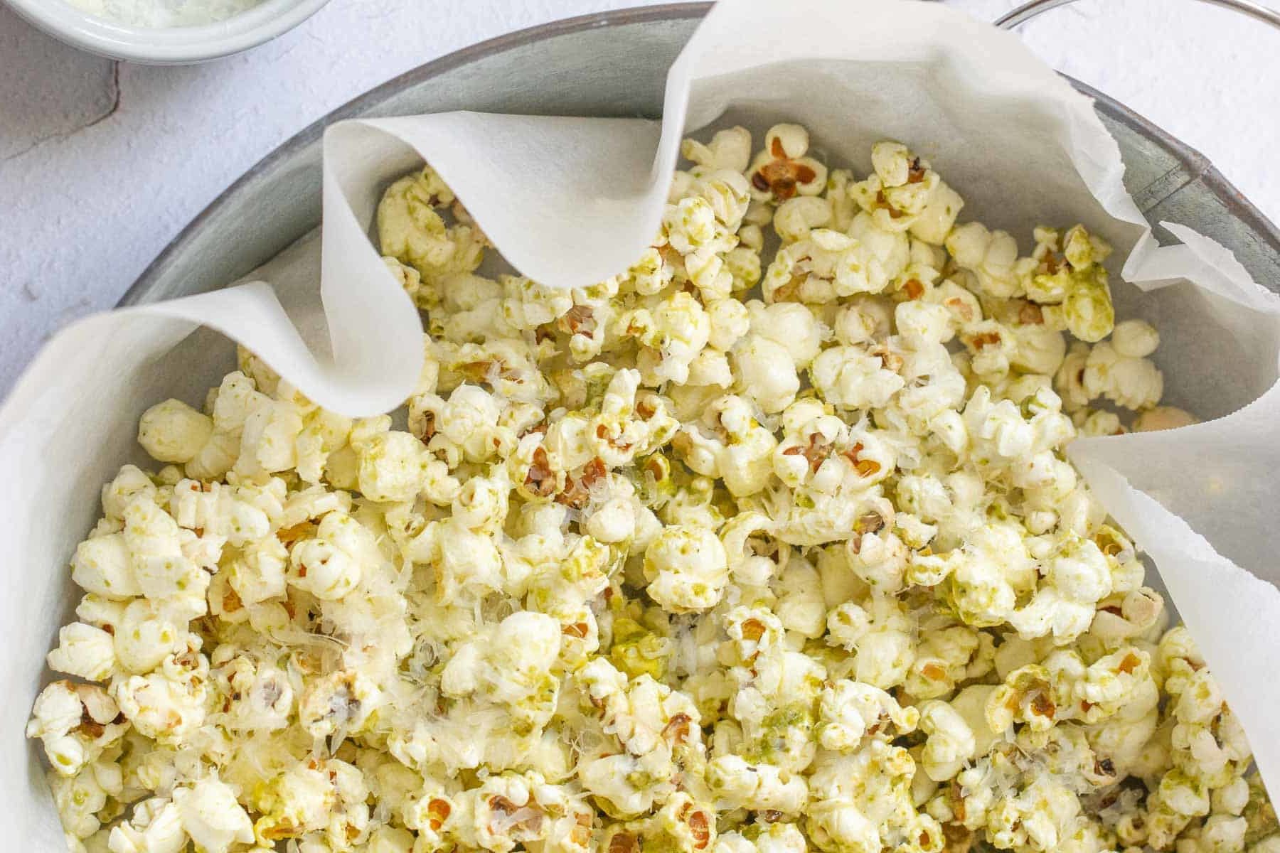 serving bowl of pesto popcorn