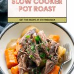 A bowl of slow cooker pot roast with shredded beef, carrots, and potatoes, garnished with parsley, next to a fork.