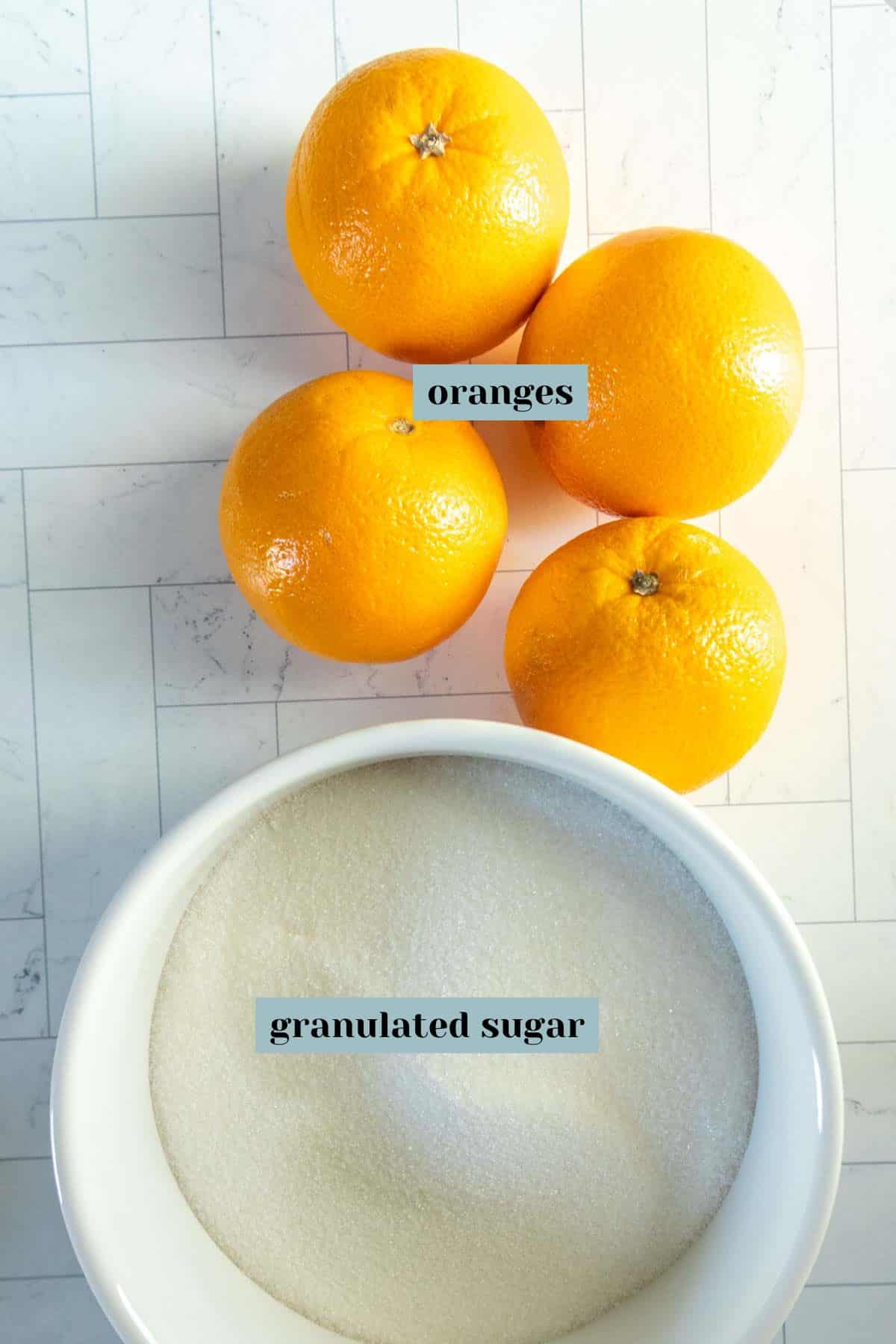 A bowl of sugar and oranges.