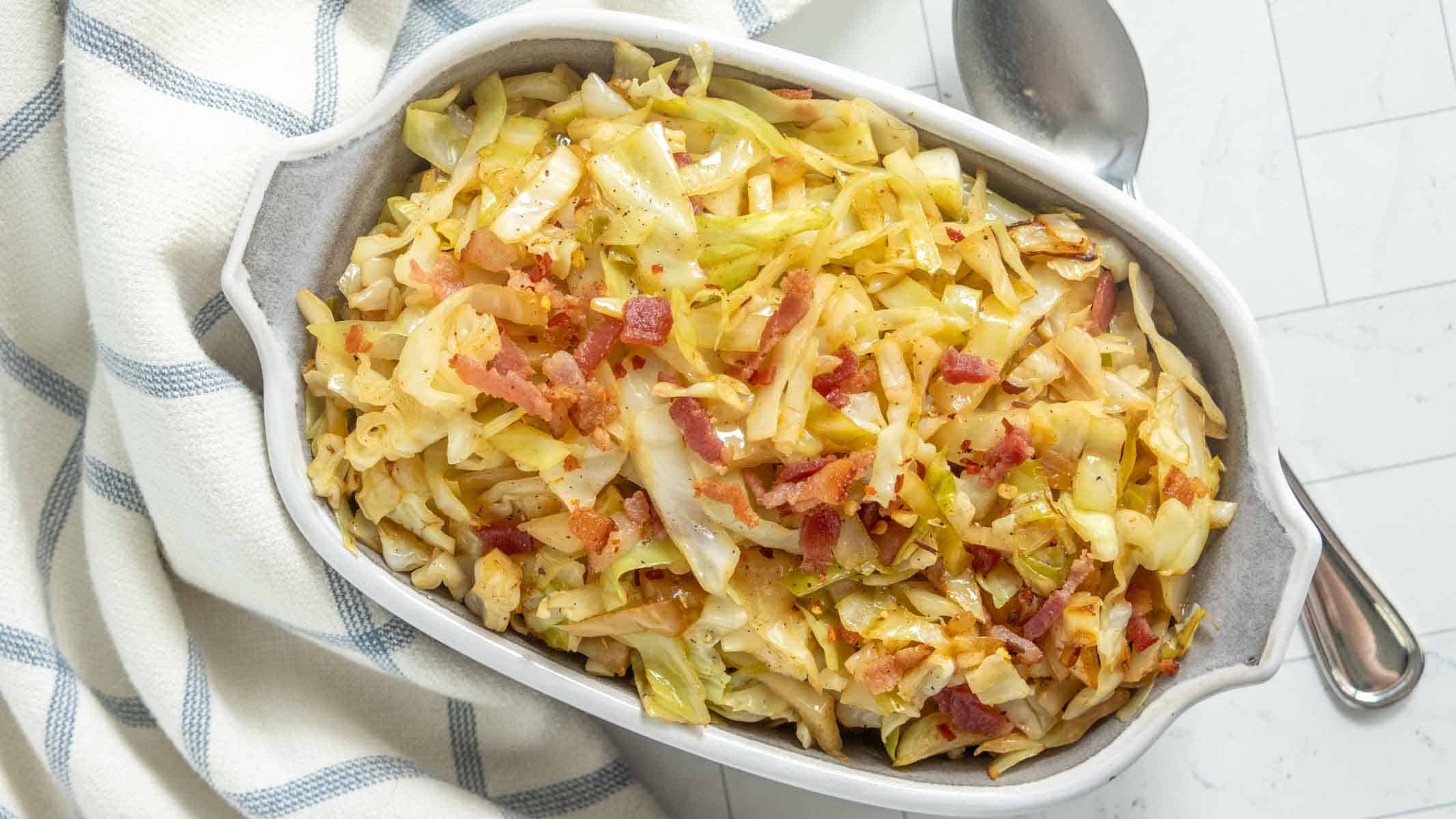 Sautéed cabbage with crispy bacon pieces.