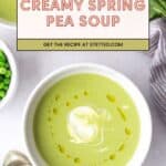 Bowl of creamy green pea soup garnished with cream, surrounded by fresh peas, mint leaves, and a spoon on a light surface. Text overlay reads "Creamy Spring Pea Soup.