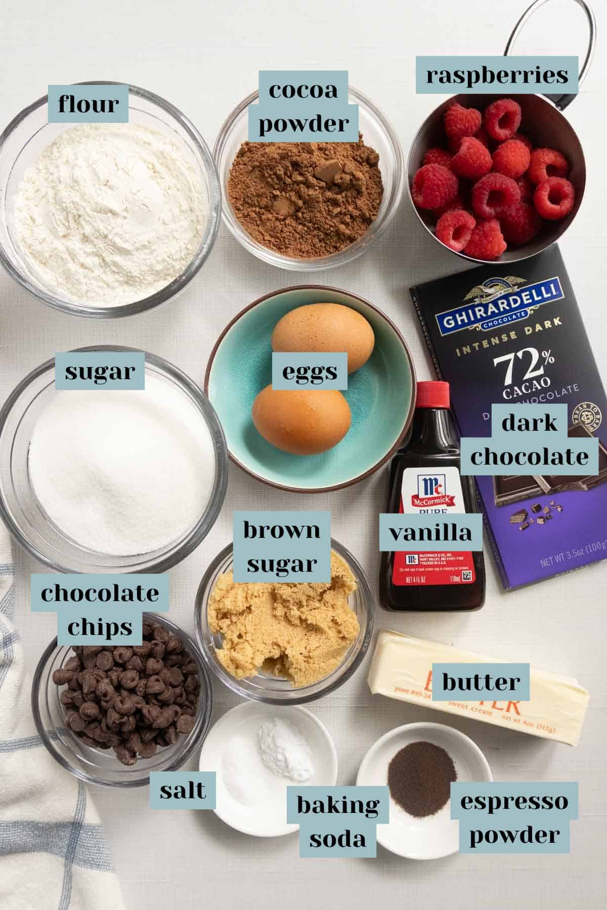 Chocolate Raspberry Cookies - Festively chocolate cookies studded with raspberry for the Great Food Blogger Cookie Swap. A flat lay of cookie ingredients with label overlay.