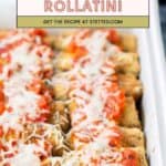 A baking dish filled with breaded eggplant rollatini topped with tomato sauce and melted cheese.