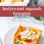 A slice of butternut squash lasagna on a white plate, with visible cheese and spinach layers, sits in front of a baking dish.