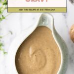 A ceramic gravy boat filled with vegetarian gravy, with the text “Vegetarian Gravy” and “Get the recipe at Stetted.com” overlaid at the top.