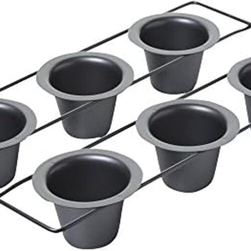 A metal rack holding six individual dark gray baking cups in a two-by-three arrangement.